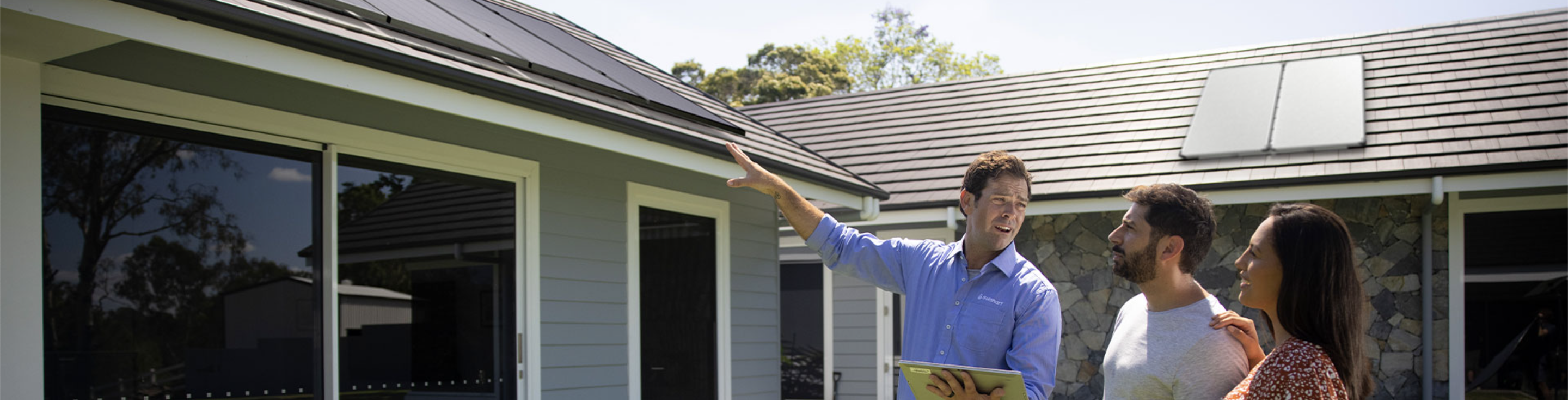 Solarhart expert and home owners discussing solar